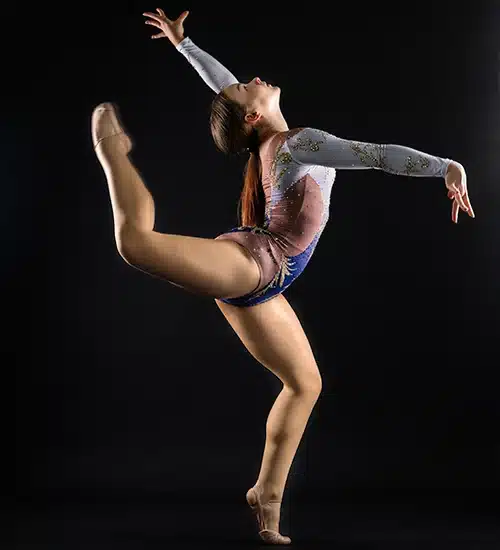 a woman doing gymnastics