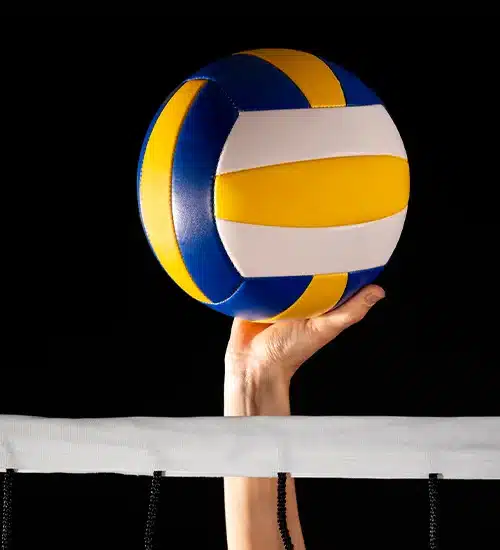 hand holding a volleyball